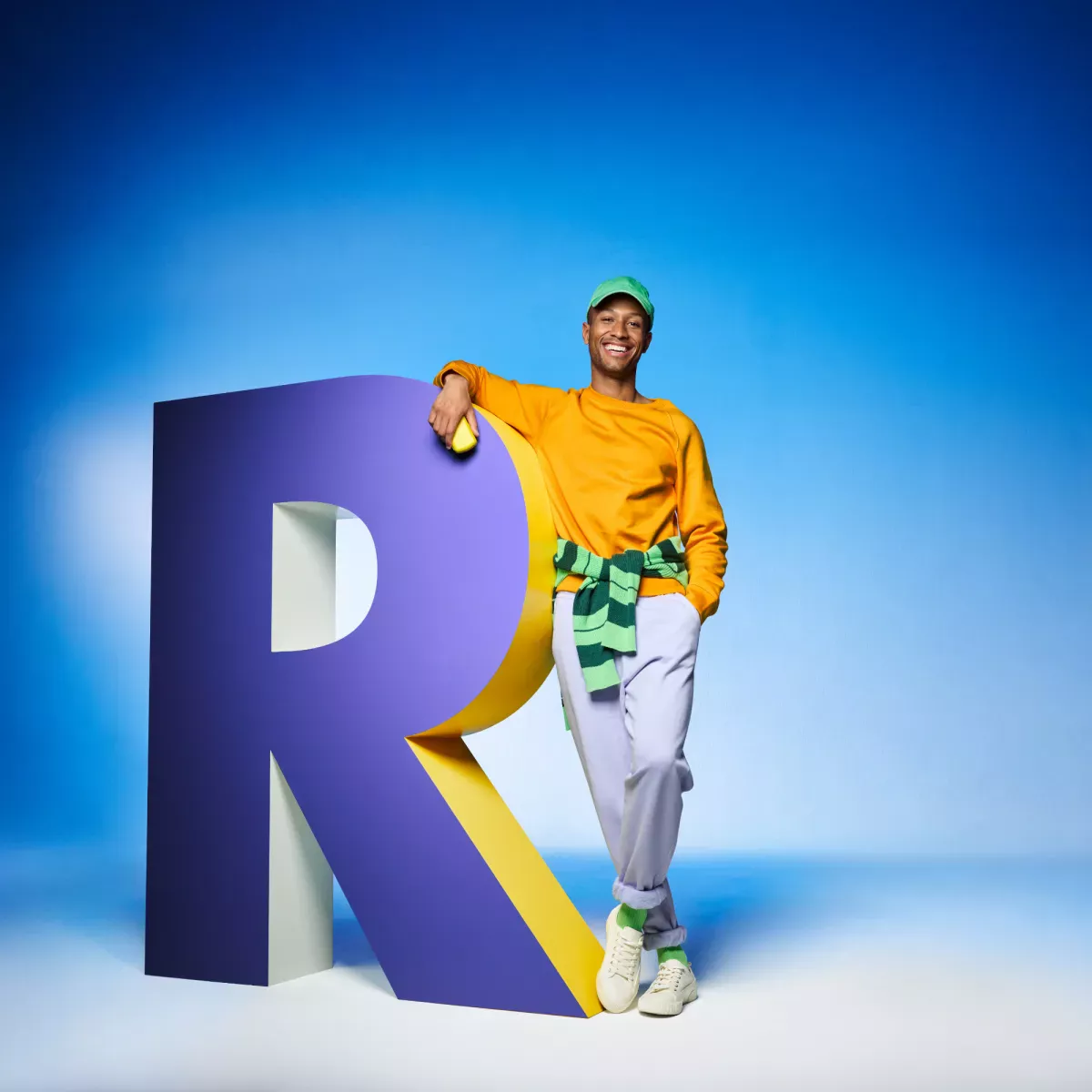 Smiling man holding travel set