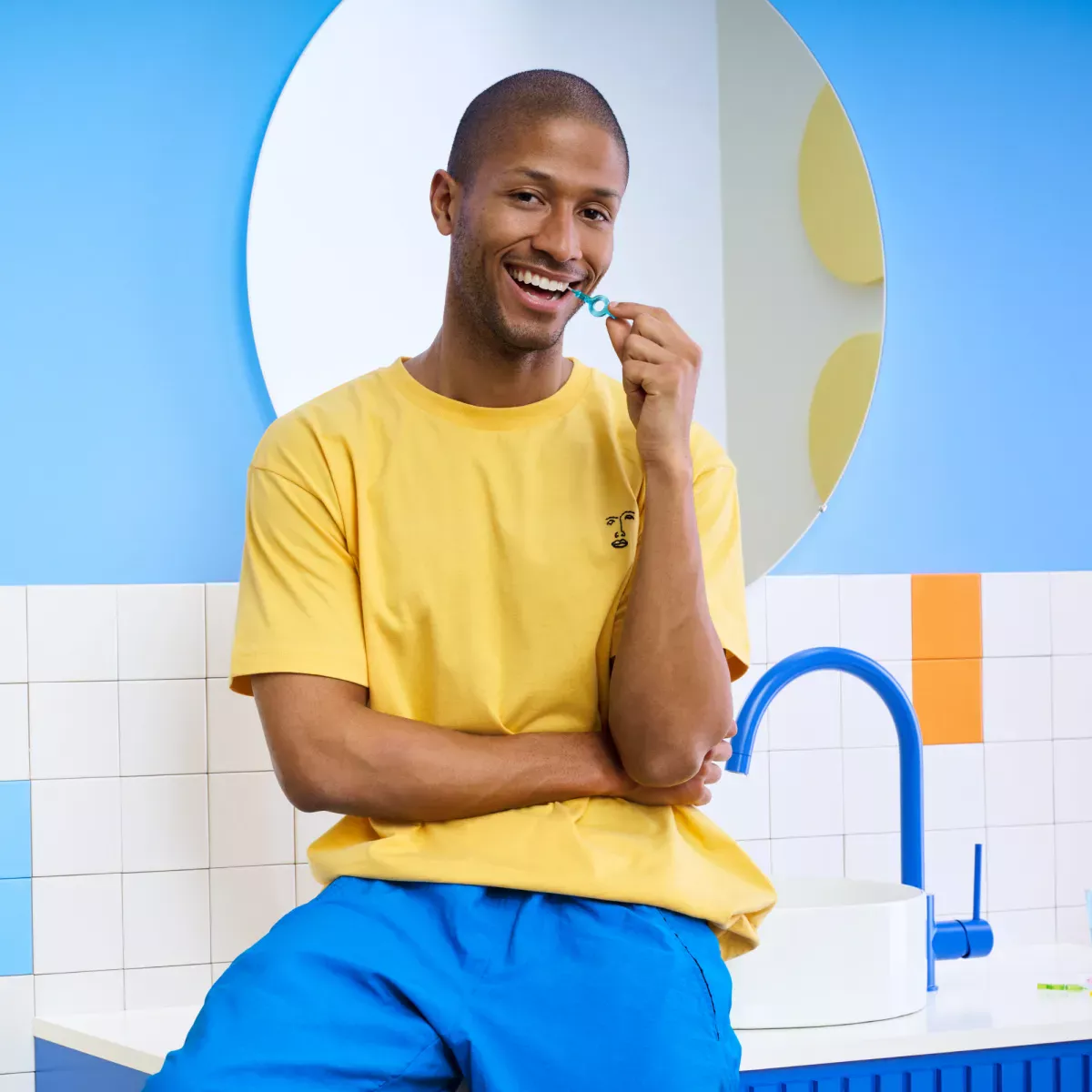 Man using interdental brush