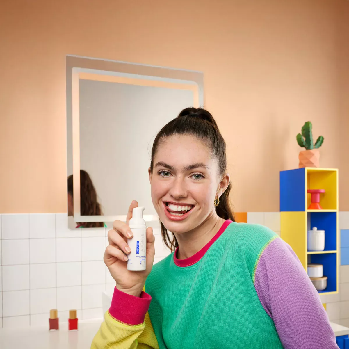 Woman holding aligner foam