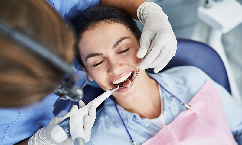 What happens during professional teeth cleaning?